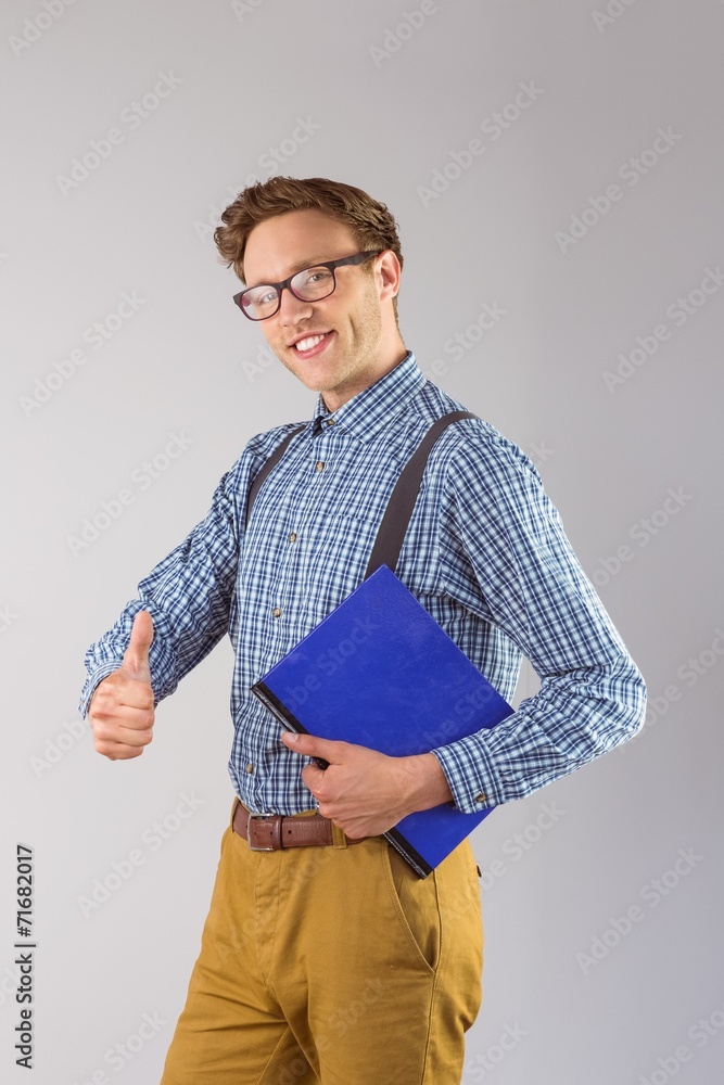 Poster Geeky student holding a notebook