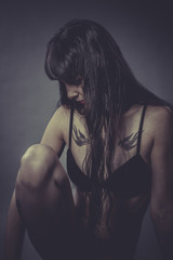 Tattoed, Sensual brunette woman in lingerie