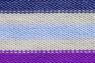 Fototapeta premium Knit woolen texture. Fabric striped background