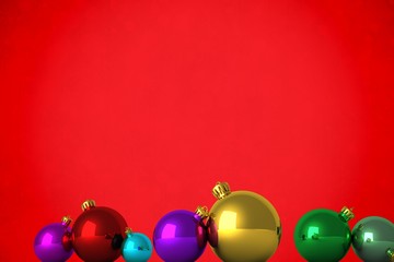 Composite image of christmas baubles