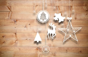 Fototapeta na wymiar Composite image of hanging christmas decorations