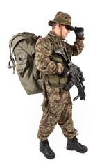 Soldier with rifle on a white background