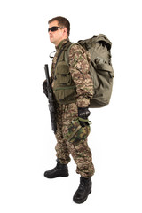 Soldier with rifle on a white background