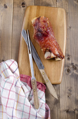 knuckle of pork on wooden board