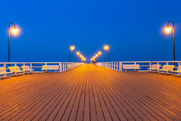 Fototapeta premium Wooden pier at Baltic sea in Gdynia Orlowo, Poland