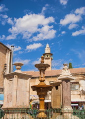 Fototapeta na wymiar old fountain in square Muristan in Jerusalem