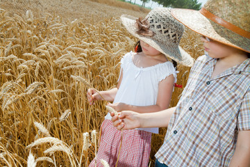 Little children in wheat