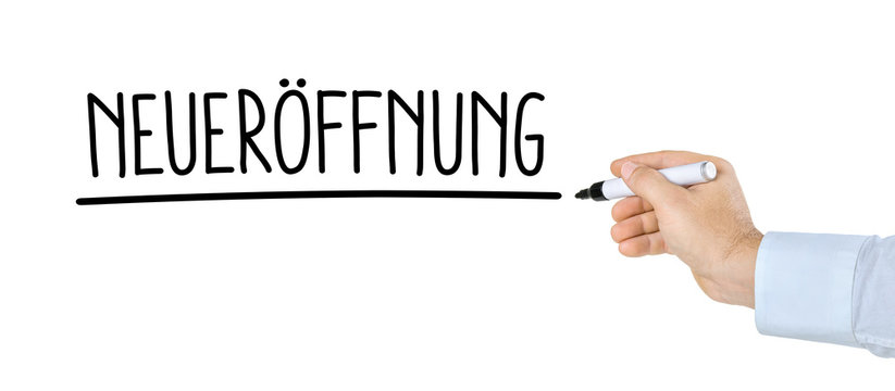 Hand mit Stift schreibt Neuer&ouml;ffnung