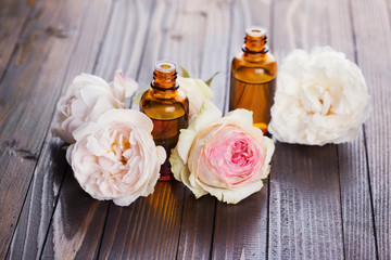 Fototapeta na wymiar Essential aroma oil with roses