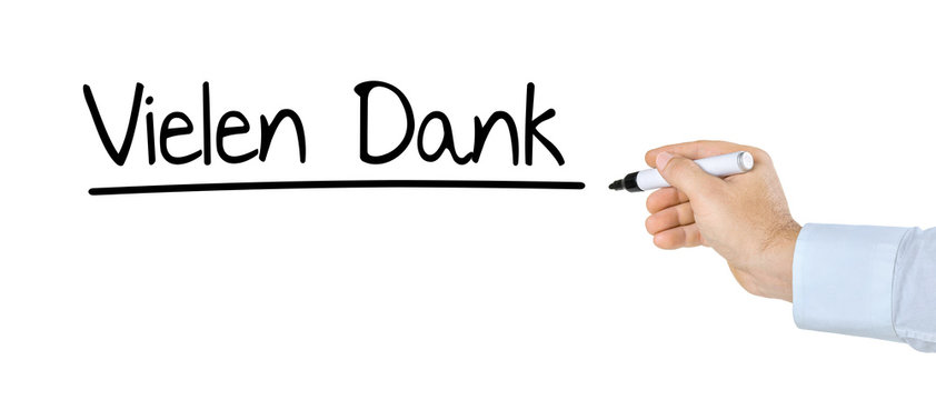 Hand mit Stift schreibt Vielen Dank