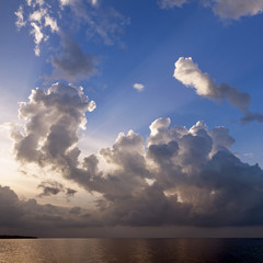 Sunset and clouds over sea