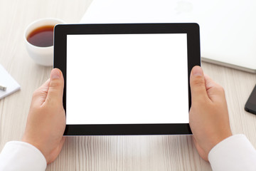 businessman holding a tablet with isolated screen in the office