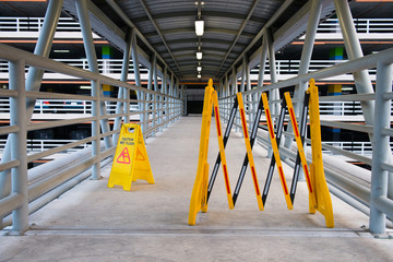 Wet floor sign on a corridor