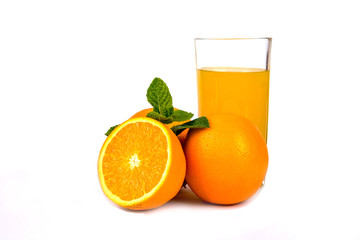 Three oranges with juice