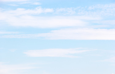 Fantastic soft white clouds against blue sky