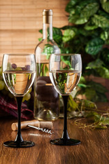 Bottle and glasses of white wine