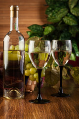 Bottle and glasses of white wine