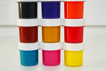 Jars with colorful paint