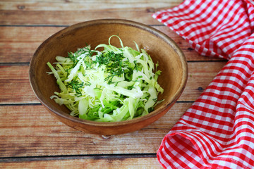 young cabbage salad with dill