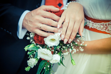 Couple holding hands