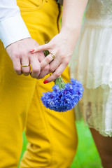 Couple holding hands