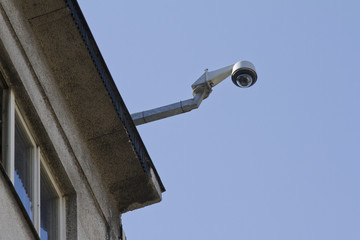 Fototapeta premium Camera on building watching you