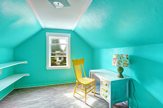 Bright Turquoise Room With Desk And Chair