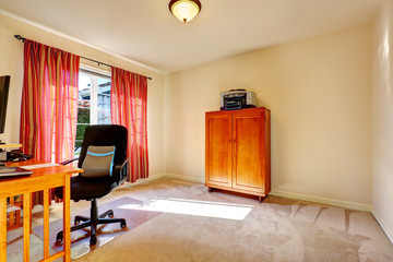 Simple office room with wooden cabinet