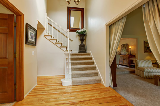 Luxury house interior. Hallway with staircase
