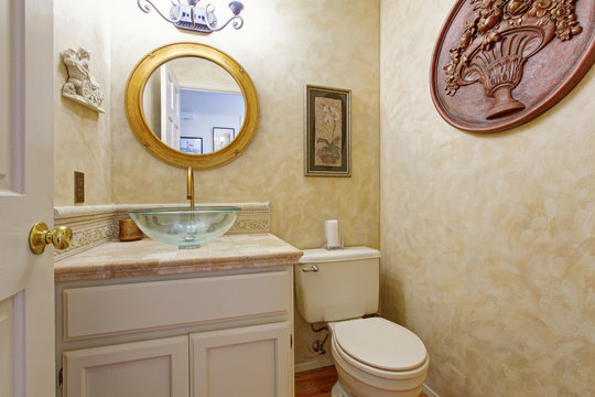Bathroom vanity cabinet with glass vessel sink