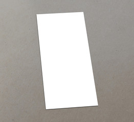 Blank white paper (4"x 8") flyer on floor
