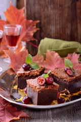 Fototapeta na wymiar brownie slices with cranberries, food closeup
