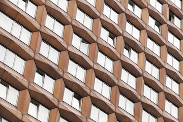 Modern architecture abstract fragment, metal facade with windows