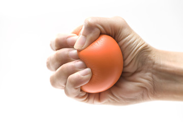 Hand squeezing a stress ball