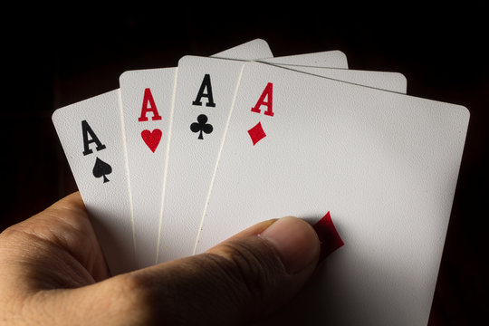 Four Aces  in hand for play gamble.