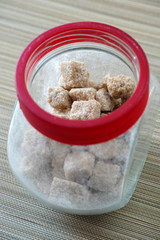 Brown cane sugar in a jar