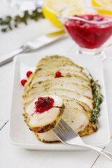 Chicken fillet slices with thyme and cranberry sauce