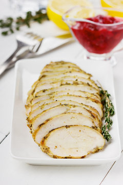 Chicken fillet slices with thyme and cranberry sauce