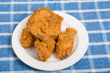Fried Chicken on Small Plate and Blue Towel