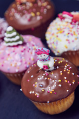 Christmas cupcakes with snowman, different colors