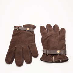 Brown velvet gloves isolated on white