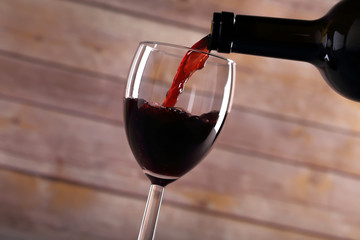 Pouring red wine - 71731637
