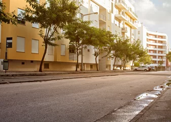 Tafelkleed Empty street road in city with buildings © artemiykas