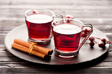 two glasses of red hot drink