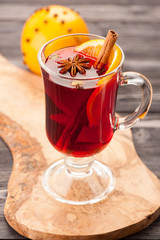 Christmas hot drink mulled wine with spices in glass
