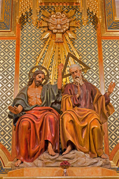 Madrid - Statue of Trinity from altar of Almudena cathedral