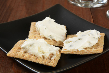 Crackers with cream cheese