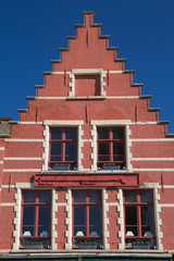 Red gable roof of the historic house