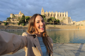 Woman photographing a selfie in Palma de Mallorca Cathedral © Antonioguillem