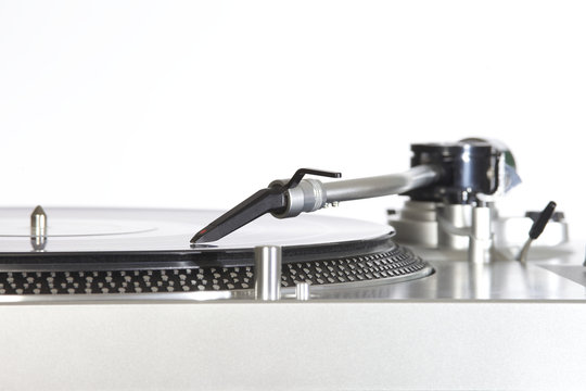 turntable with a vinyl isolated on white background
